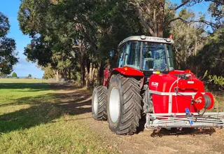 Tractor carrying out firebreak work